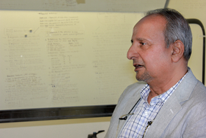 Protul Shrikant is building bridges between diverse departments within the UA to enlist the immune system in the fight against cancer. (Photo: Anna C. Christensen/UA Cancer Center) Protul Shrikant is building bridges between diverse departments within the UA to enlist the immune system in the fight against cancer. (Photo: Anna C. Christensen/UA Cancer Center)
